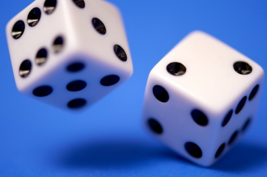 Illuminated slot machine display showing jackpot symbols