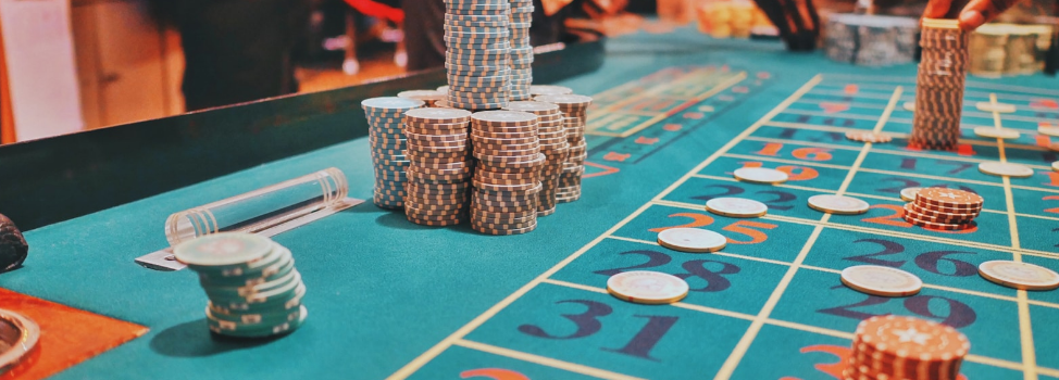 Wide view of Atlantic City boardwalk casinos at night